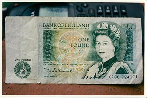 Гроздобер фотографија на британски пари.