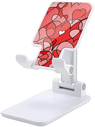 Апстрактна loveубов срце позадина мобилниот телефон стојат преклопен телефонски држач за прилагодување на додатоци за биро за